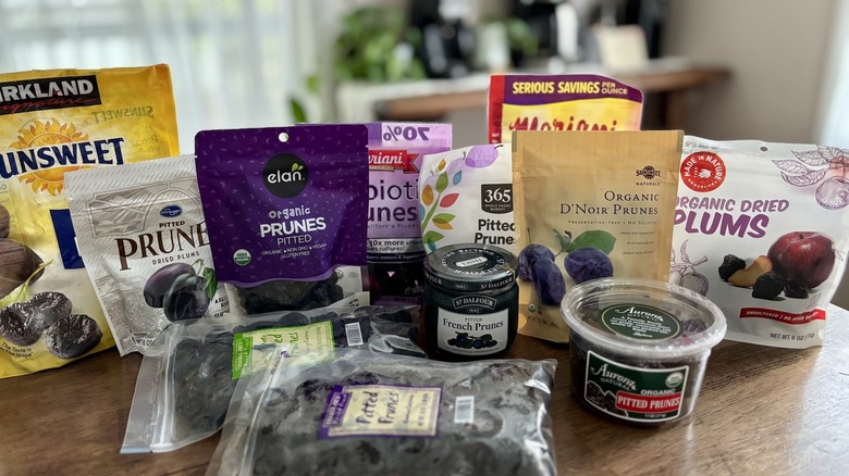 assortment of prune packages on a table