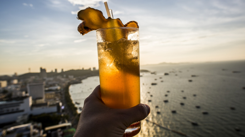 A tropical cocktail in front of the beach