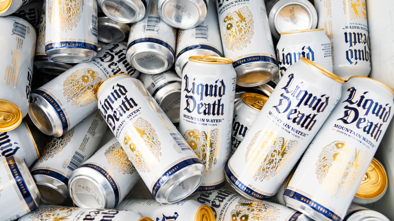 Pile of Mountain Water Liquid Death drink cans